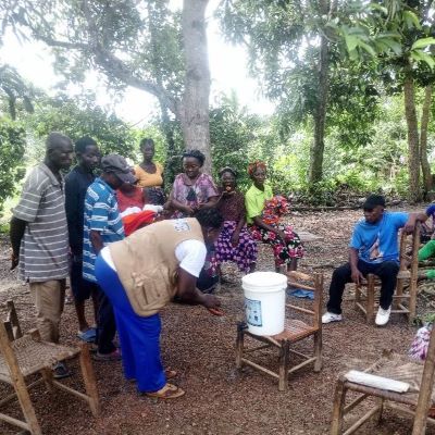 Teaching villagers how to wash hands properly